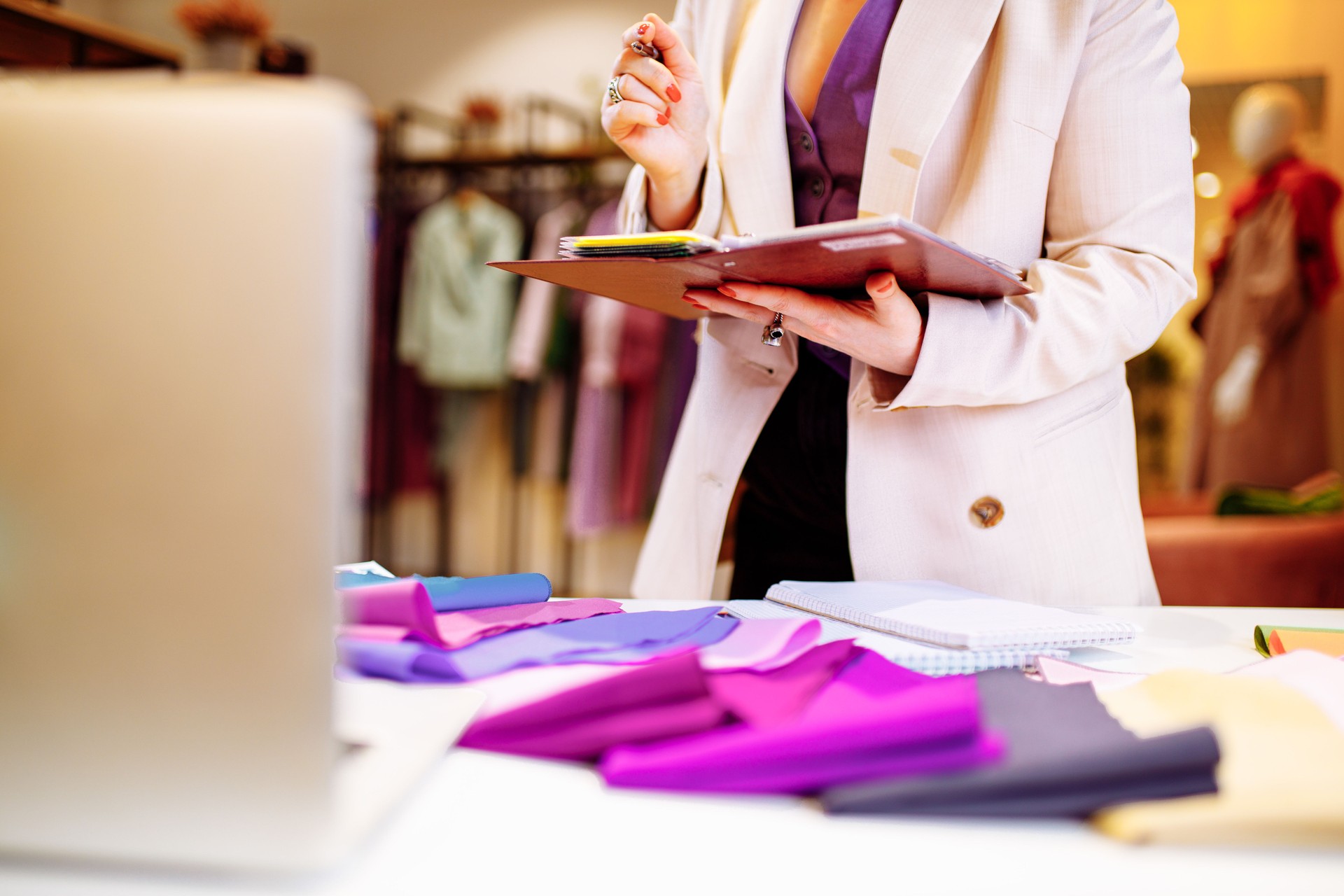 the stylist conducts a color type procedure for a woman,personal consultation about color in clothing